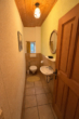 WC EG des Haupthauses - Bauernhof mit Wohnbebauung, Pferdestall und angrenzender Koppel auf großzügigem Grundstück 9716 qm